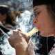 Rob Vallela of Denver smokes as thousands gather to celebrate Colorado’s medicinal-marijuana laws and collectively light up at 4:20 p.m. on April 20, 2012, in Denver’s Civic Center Park.
Marc Piscotty/Getty Images